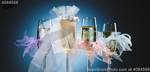 Image of Elegant wedding glasses with champagne for bride and her bridesmaids