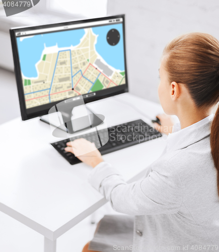 Image of businesswoman with gps navigator map on computer