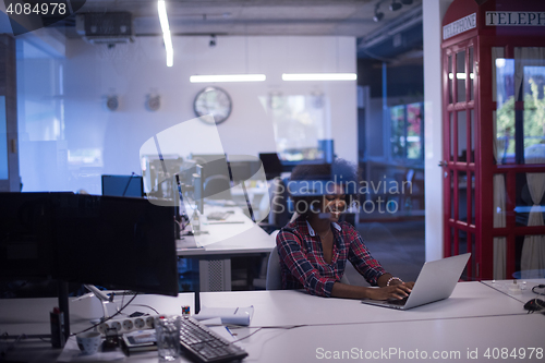 Image of portrait of a young successful African-American woman in modern 