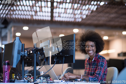 Image of portrait of a young successful African-American woman in modern 