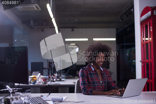 Image of portrait of a young successful African-American woman in modern 