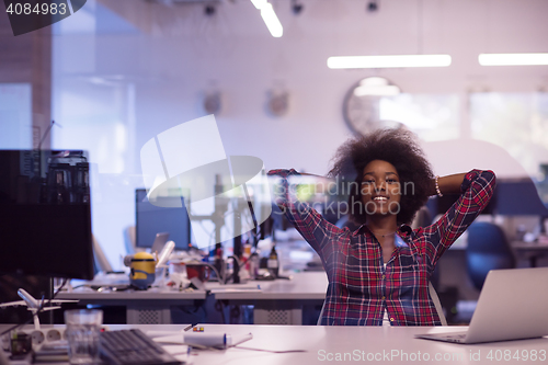 Image of portrait of a young successful African-American woman in modern 