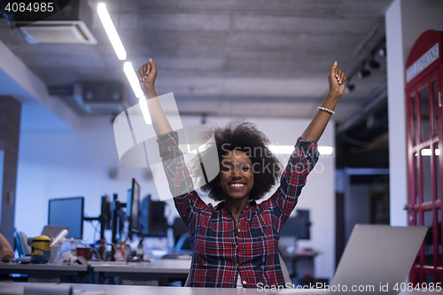 Image of portrait of a young successful African-American woman in modern 