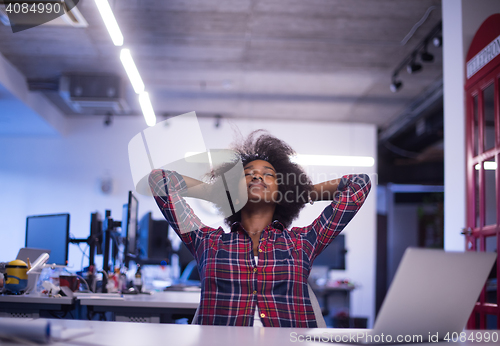 Image of portrait of a young successful African-American woman in modern 