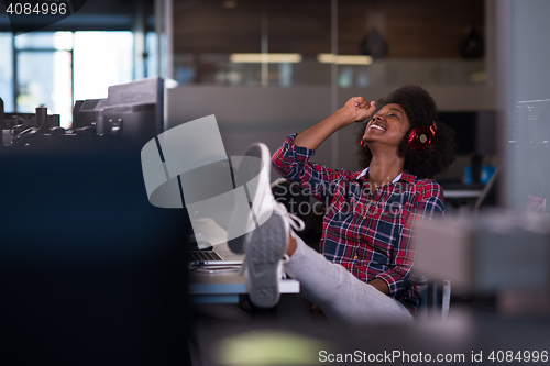 Image of portrait of a young successful African-American woman in modern 