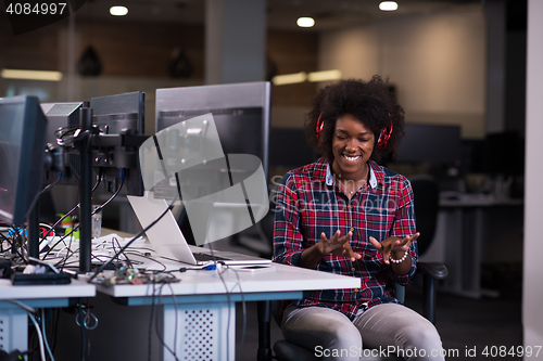 Image of portrait of a young successful African-American woman in modern 