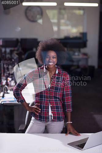 Image of portrait of a young successful African-American woman in modern 