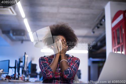 Image of portrait of a young successful African-American woman in modern 