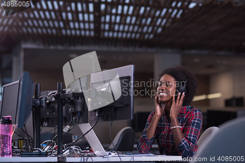 Image of portrait of a young successful African-American woman in modern 