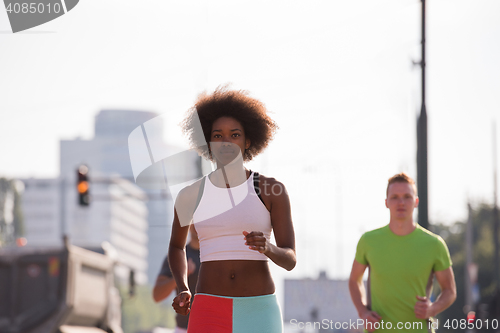 Image of multiethnic group of people on the jogging