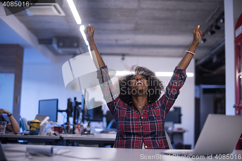 Image of portrait of a young successful African-American woman in modern 