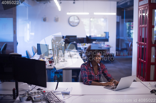 Image of portrait of a young successful African-American woman in modern 