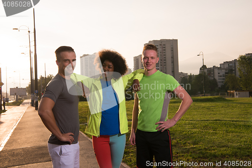 Image of portrait multiethnic group of people on the jogging