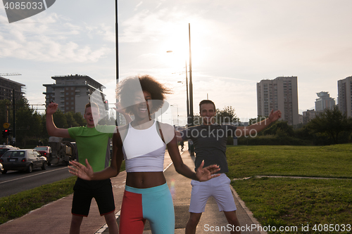 Image of multiethnic group of people on the jogging