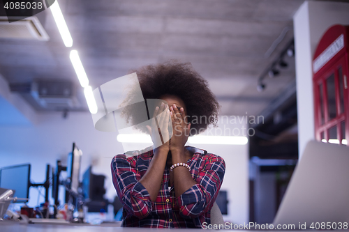 Image of portrait of a young successful African-American woman in modern 