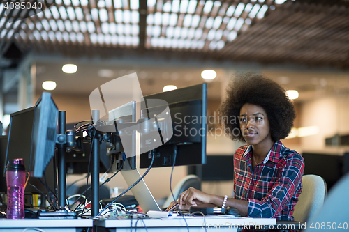 Image of portrait of a young successful African-American woman in modern 