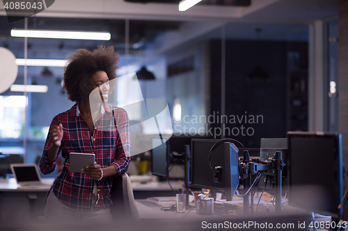 Image of portrait of a young successful African-American woman in modern 