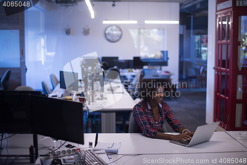 Image of portrait of a young successful African-American woman in modern 