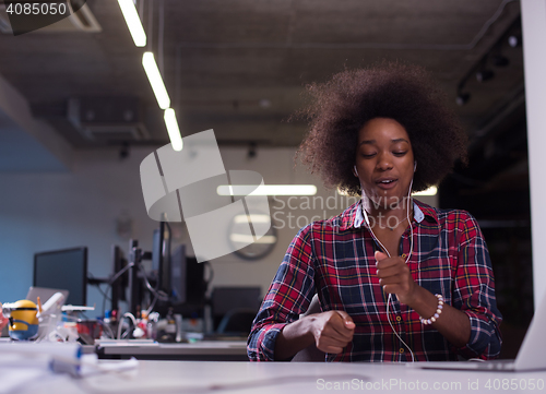 Image of portrait of a young successful African-American woman in modern 