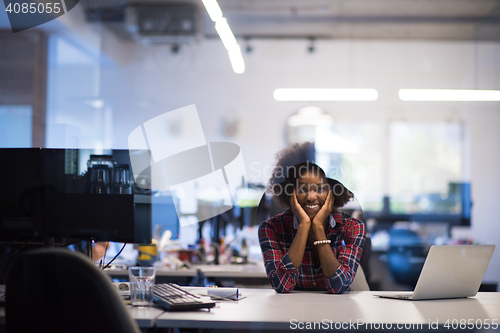 Image of portrait of a young successful African-American woman in modern 