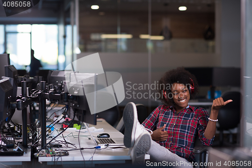 Image of portrait of a young successful African-American woman in modern 