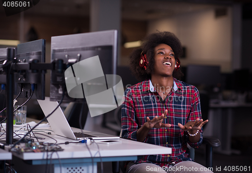 Image of portrait of a young successful African-American woman in modern 