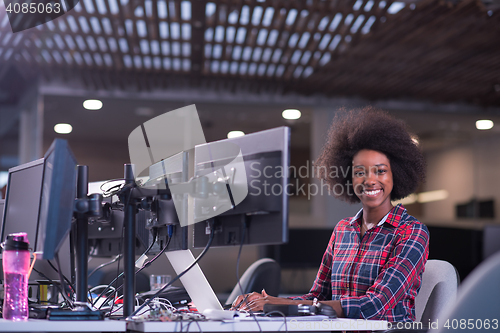 Image of portrait of a young successful African-American woman in modern 