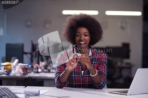 Image of portrait of a young successful African-American woman in modern 