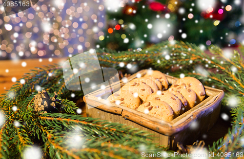 Image of natural green fir christmas wreath and oat cookies