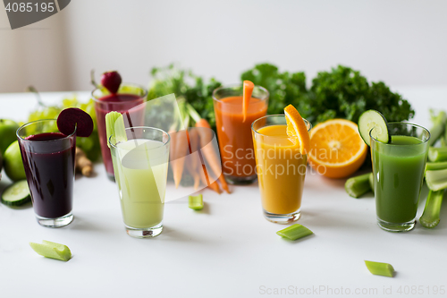 Image of glasses with different fruit or vegetable juices