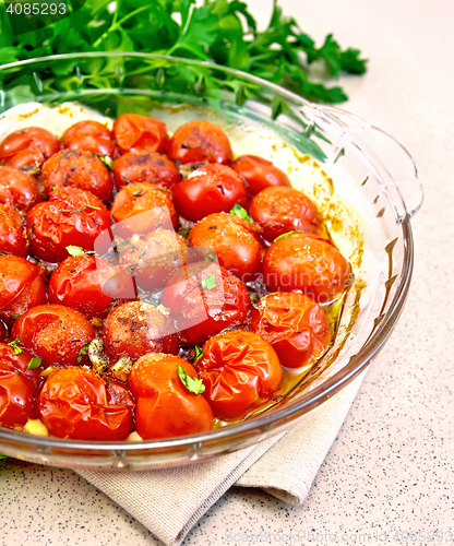 Image of Tomatoes baked on granite table