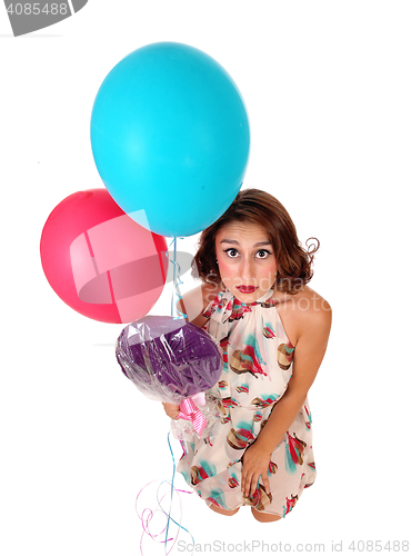 Image of Woman looking up from floor.