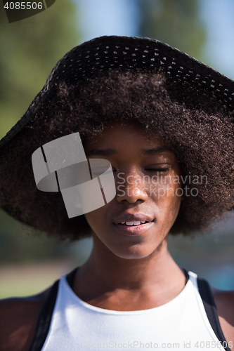 Image of Close up portrait of a beautiful young african american woman sm