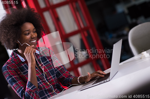 Image of portrait of a young successful African-American woman in modern 