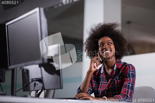 Image of portrait of a young successful African-American woman in modern 