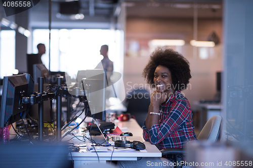 Image of portrait of a young successful African-American woman in modern 