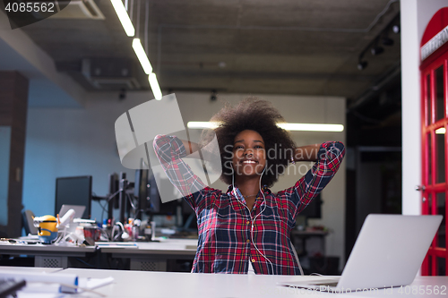 Image of portrait of a young successful African-American woman in modern 