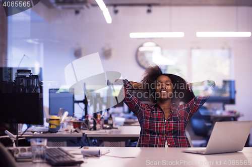 Image of portrait of a young successful African-American woman in modern 