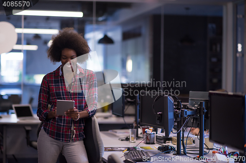 Image of portrait of a young successful African-American woman in modern 