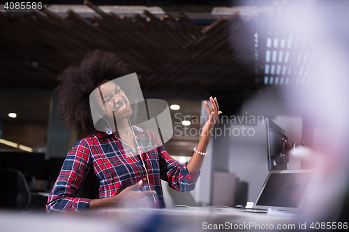 Image of portrait of a young successful African-American woman in modern 