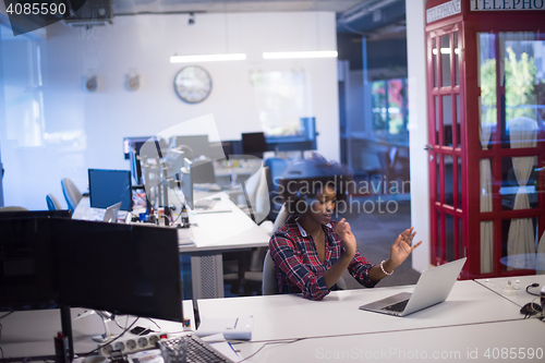 Image of portrait of a young successful African-American woman in modern 