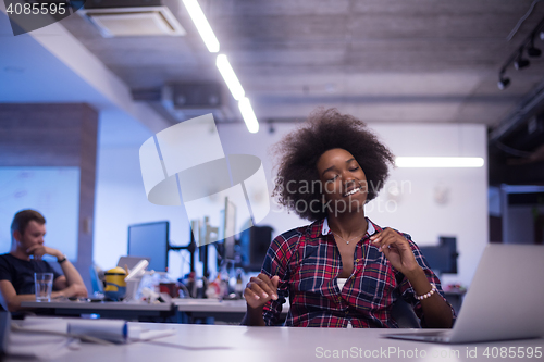 Image of portrait of a young successful African-American woman in modern 