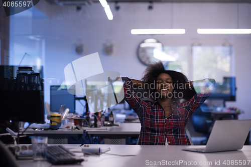 Image of portrait of a young successful African-American woman in modern 