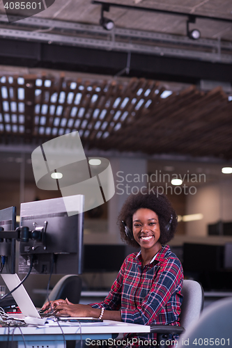 Image of portrait of a young successful African-American woman in modern 