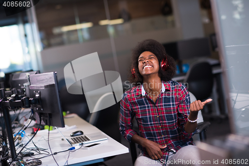 Image of portrait of a young successful African-American woman in modern 