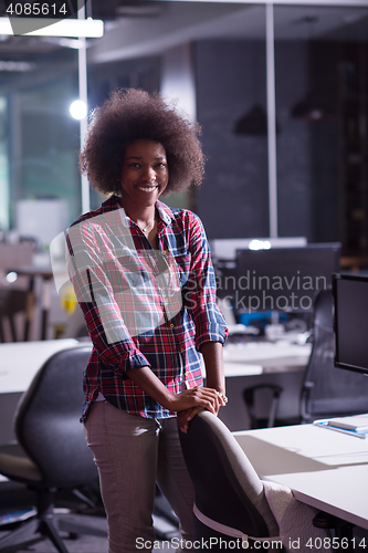 Image of portrait of a young successful African-American woman in modern 
