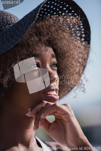 Image of Close up portrait of a beautiful young african american woman sm