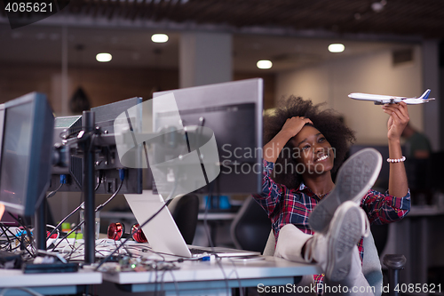 Image of portrait of a young successful African-American woman in modern 