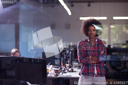 Image of portrait of a young successful African-American woman in modern 