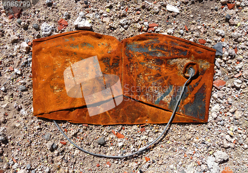 Image of Old crushed rusty bucket